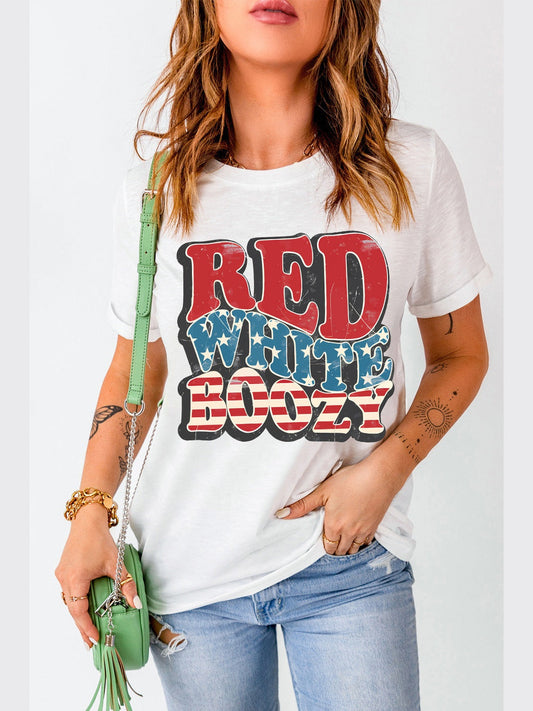 Women wearing white letter graphic round neck short sleeve T-shirt with "RED WHITE BOOZY" text and blue jeans