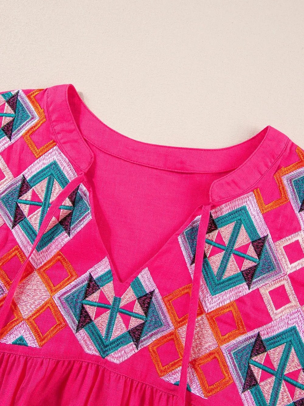 Geometric Embroidered Tassel Tie Neck Blouse NicholesGifts