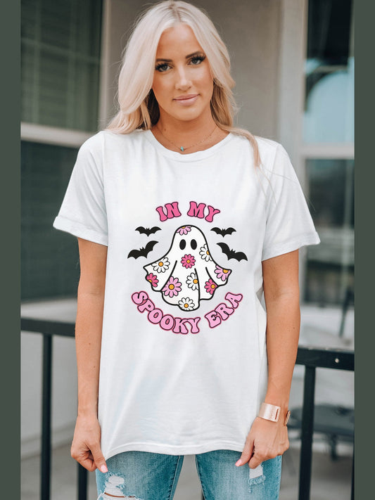 White IN MY SPOOKY ERA graphic t-shirt with ghost and bats design worn by woman