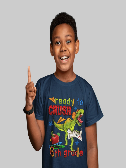 Boys Ready To Crush short sleeve tee in navy blue cotton with colorful dinosaur and 6th grade graphic print.