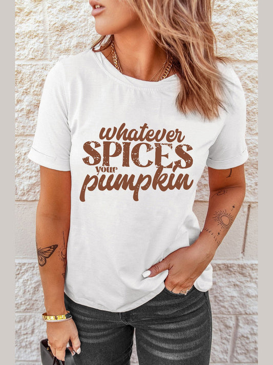White casual graphic tee with "Whatever Spices Your Pumpkin" text in brown, short sleeves, round neck, worn by model