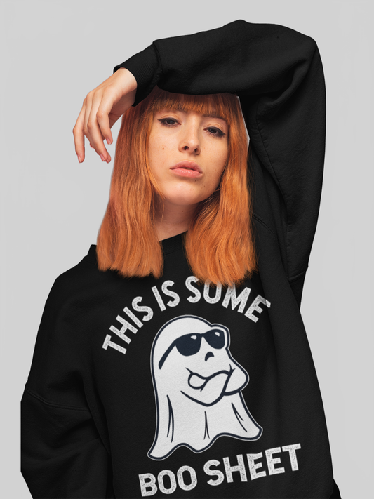 Black crewneck long sleeve sweatshirt with a white ghost graphic wearing sunglasses and the words "This is Some Boo Sheet," featuring a Spirit Of Halloween theme.