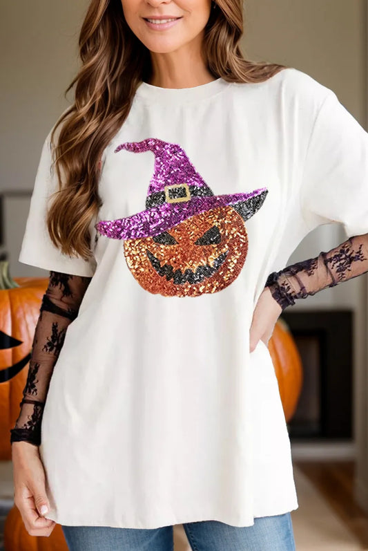 White round neck short sleeve t-shirt with sequin pumpkin wearing a purple witch hat design