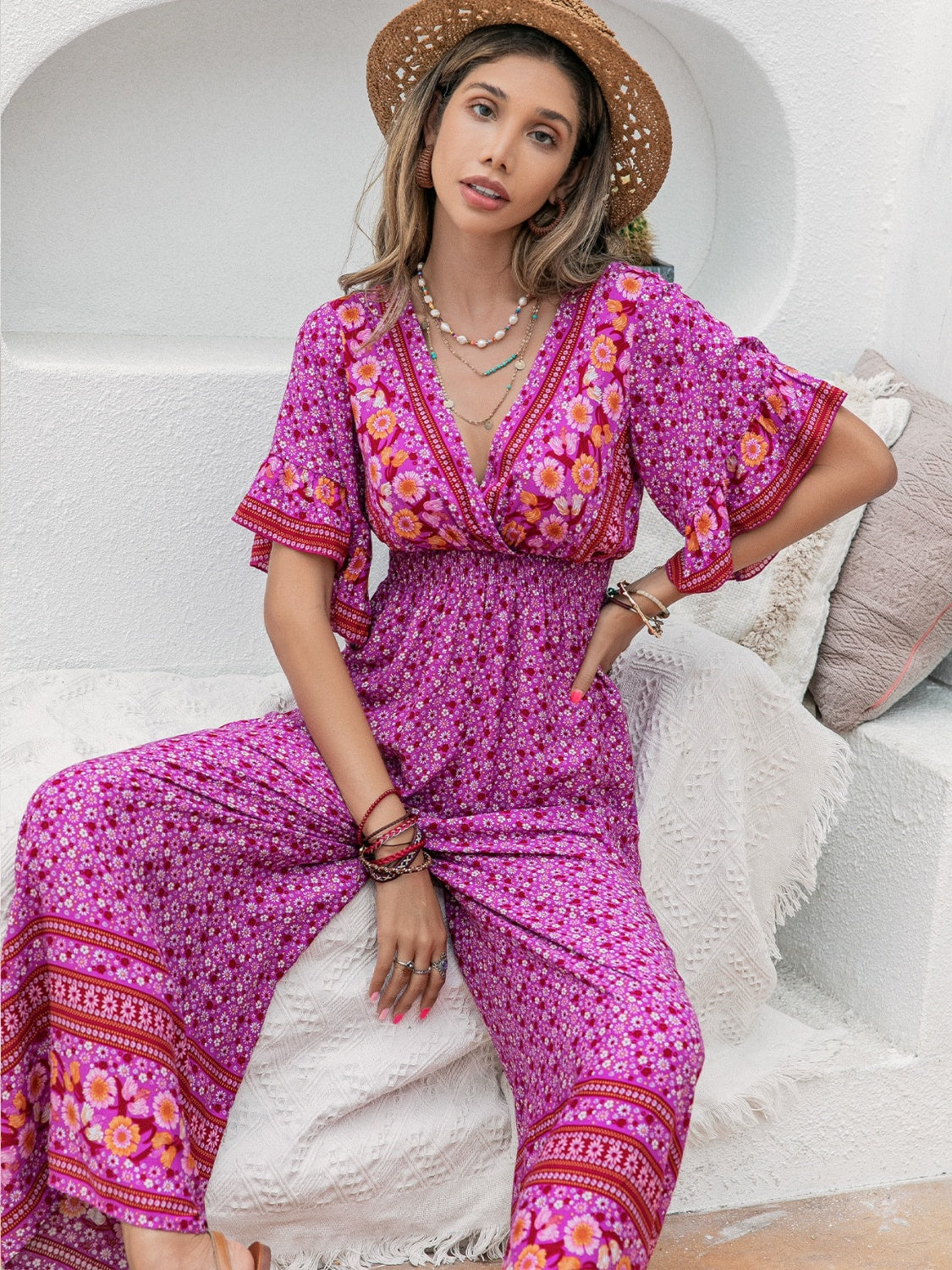 Floral Surplice Flutter Sleeve Jumpsuit nicholesgifts