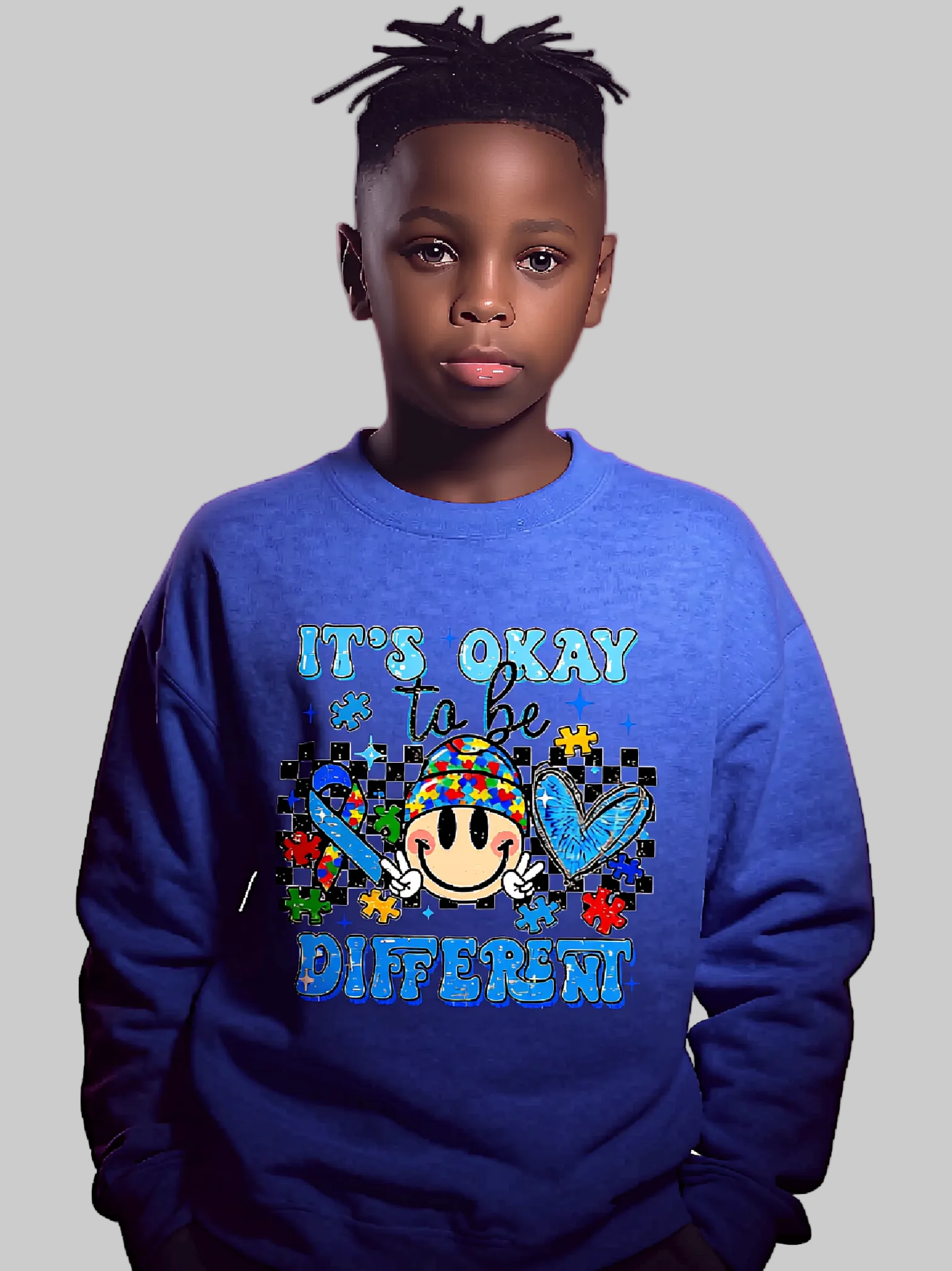 Child wearing a blue sweatshirt with a colorful design and text on a plain background NicholesGifts