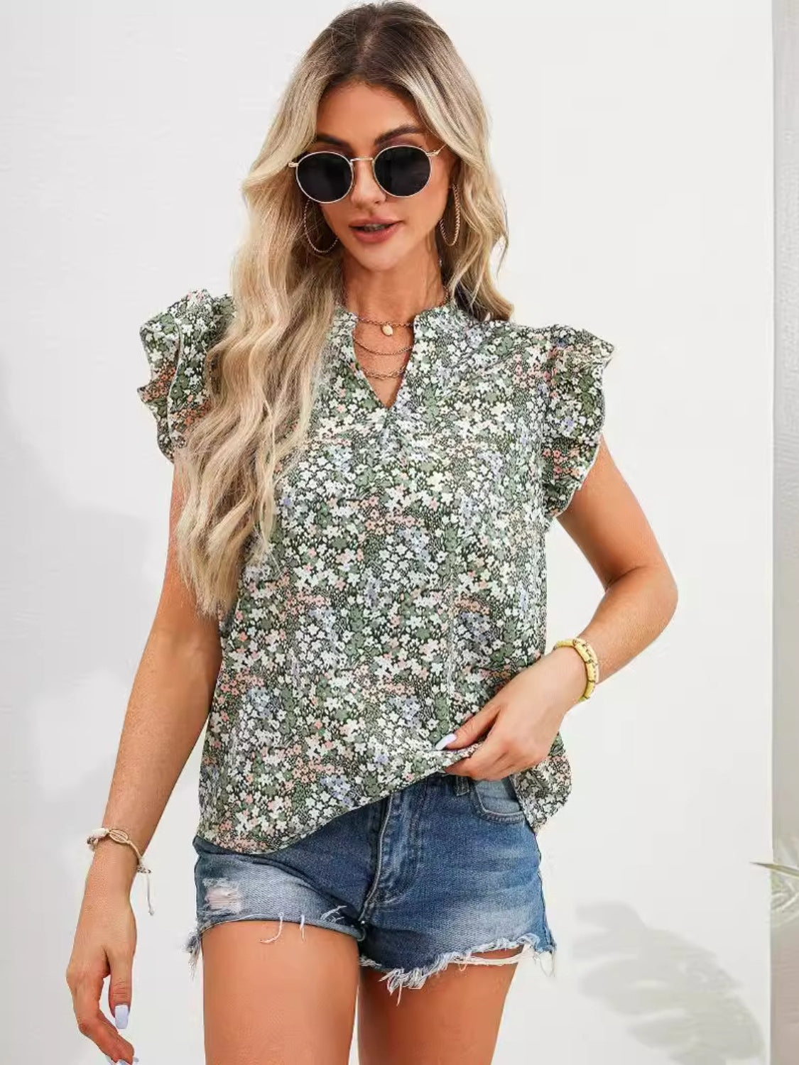 Ruffled Floral Notched Cap Sleeve Blouse nicholesgifts