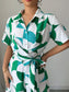 Printed Wide Leg Belted Jumpsuit nicholesgifts