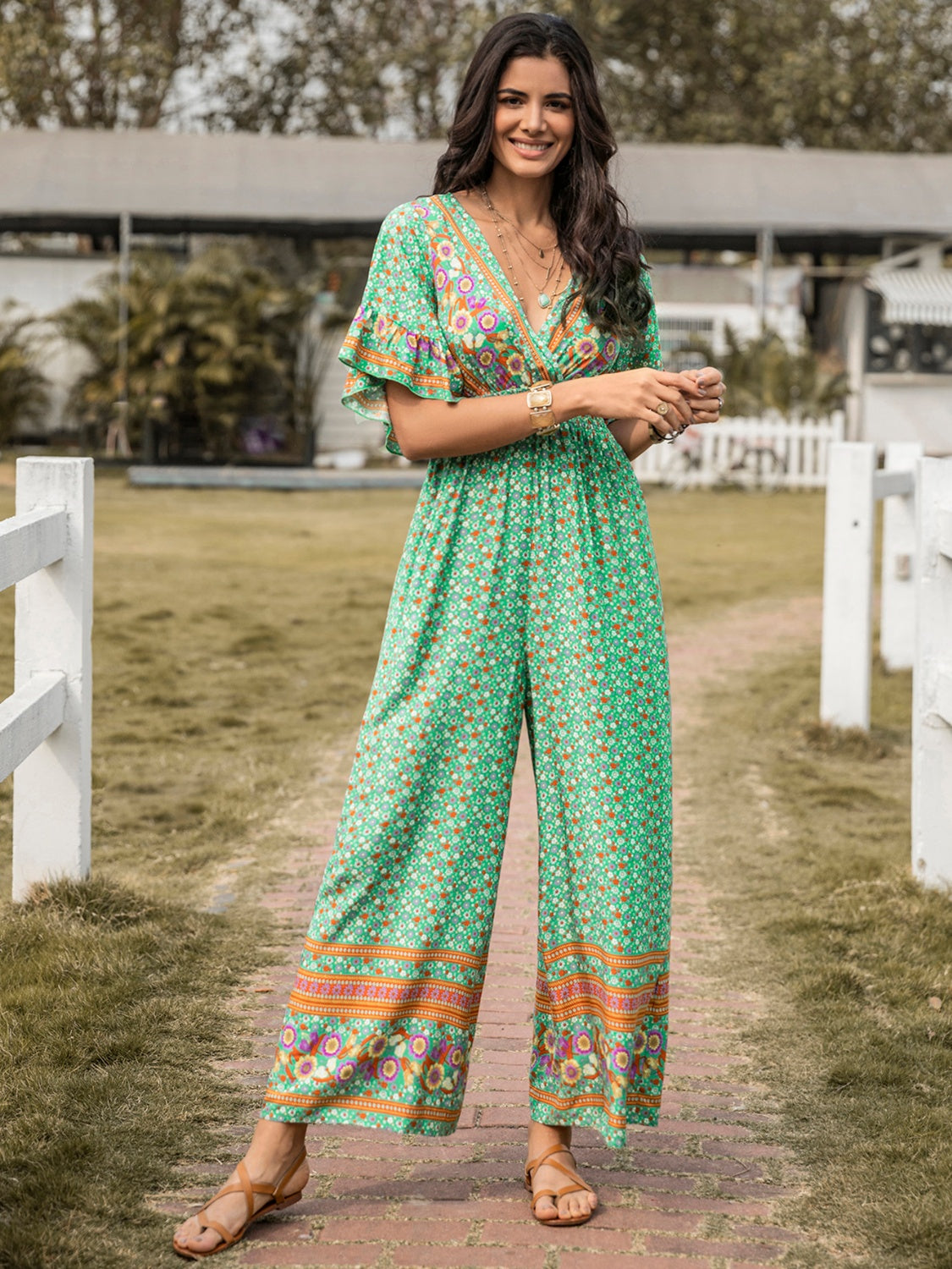 Floral Surplice Flutter Sleeve Jumpsuit nicholesgifts