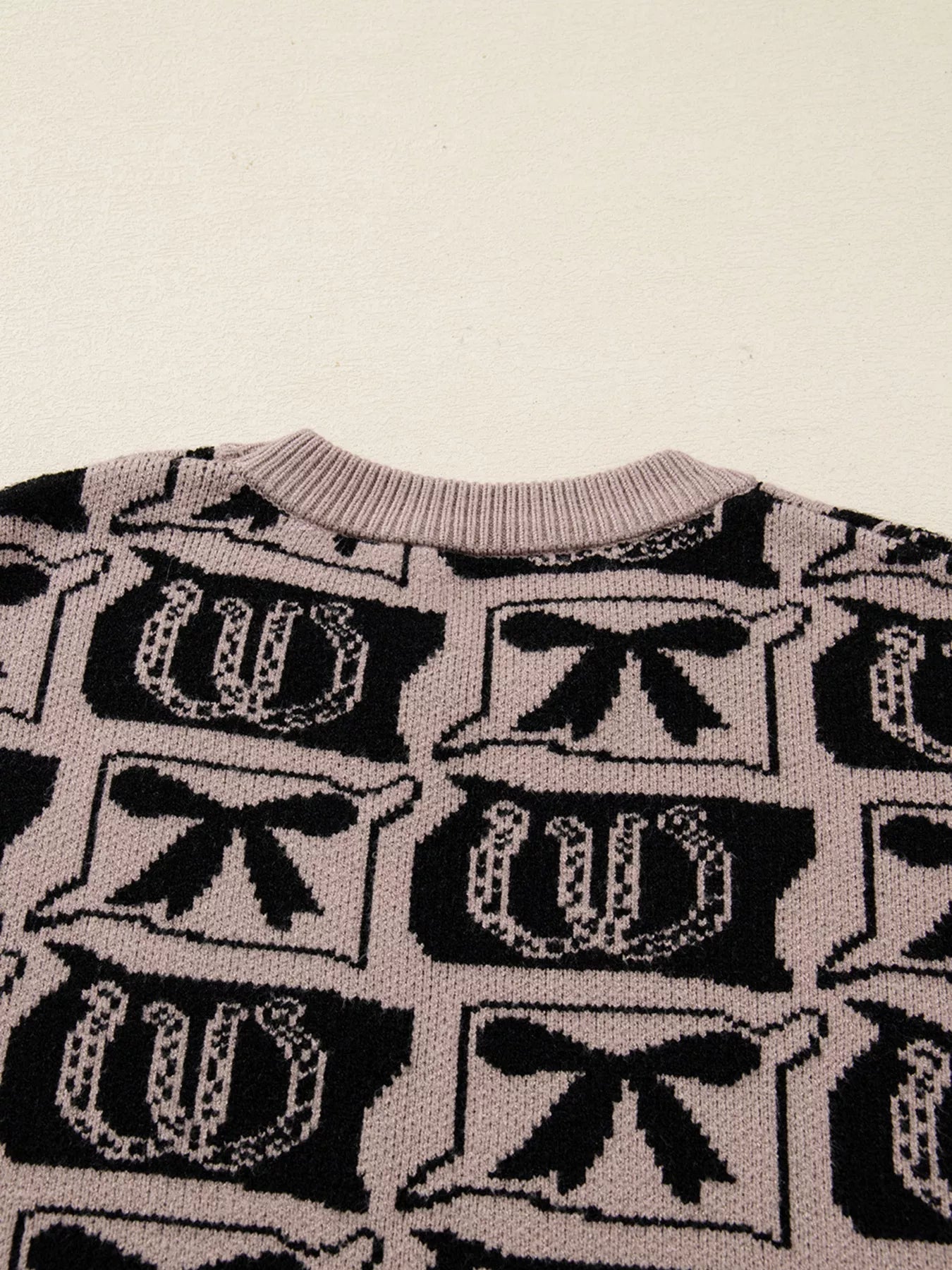 Bows & Horseshoes Pattern Round Neck Sweater Trendsi