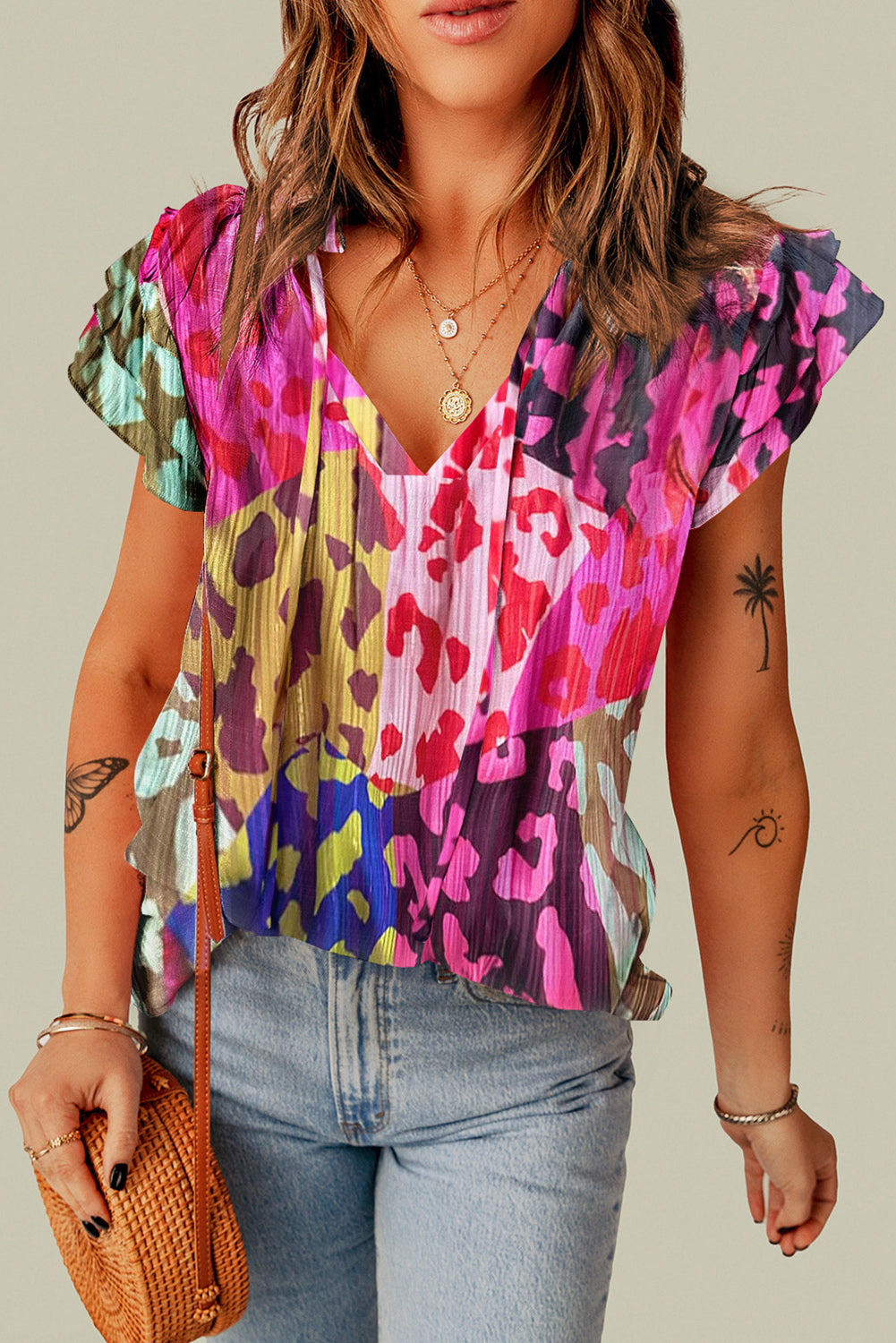 Ruffled Printed Tie Neck Cap Sleeve Blouse nicholesgifts