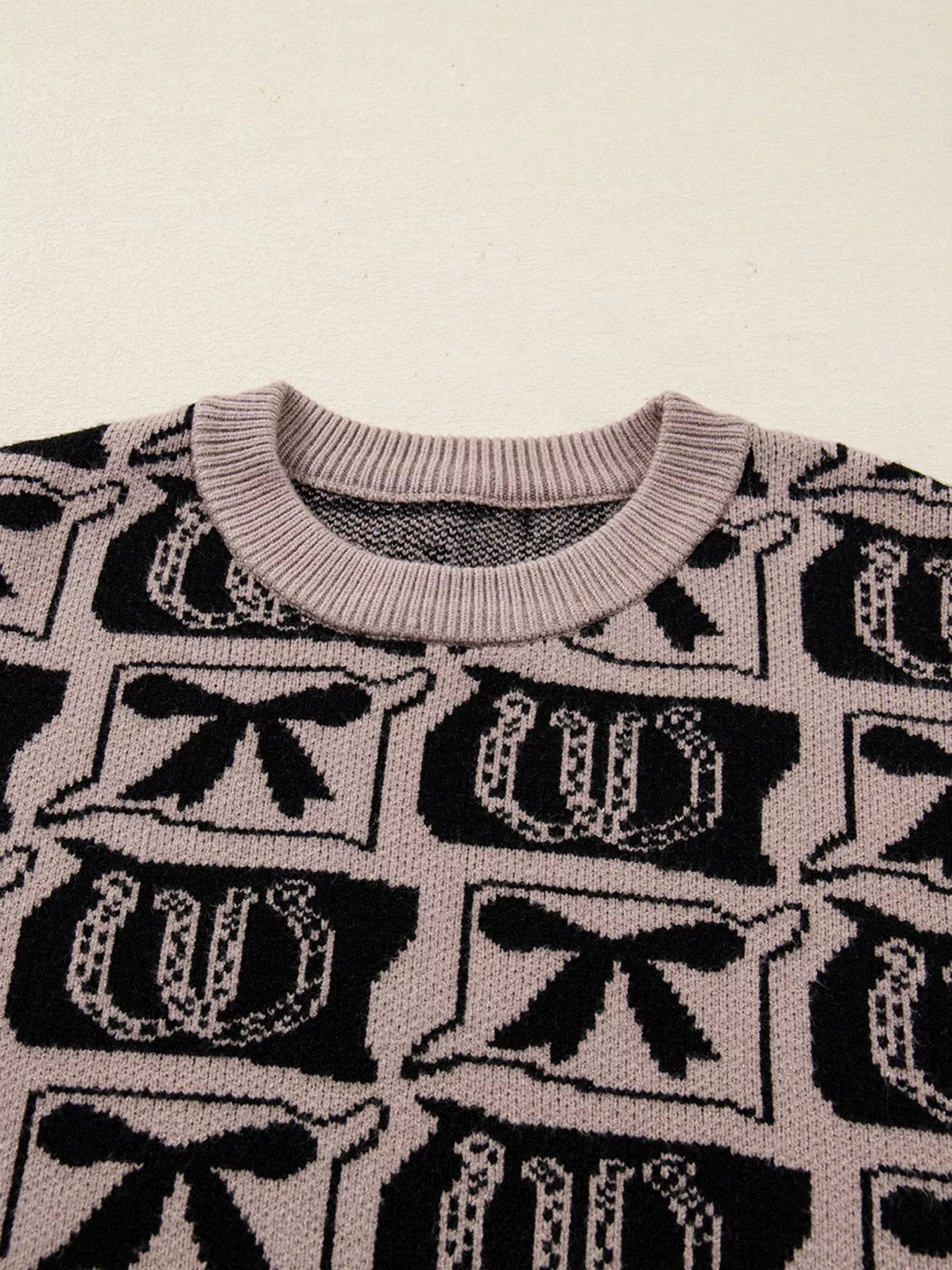 Bows & Horseshoes Pattern Round Neck Sweater Trendsi