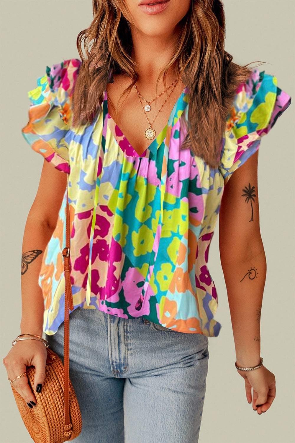 Ruffled Printed Tie Neck Cap Sleeve Blouse nicholesgifts