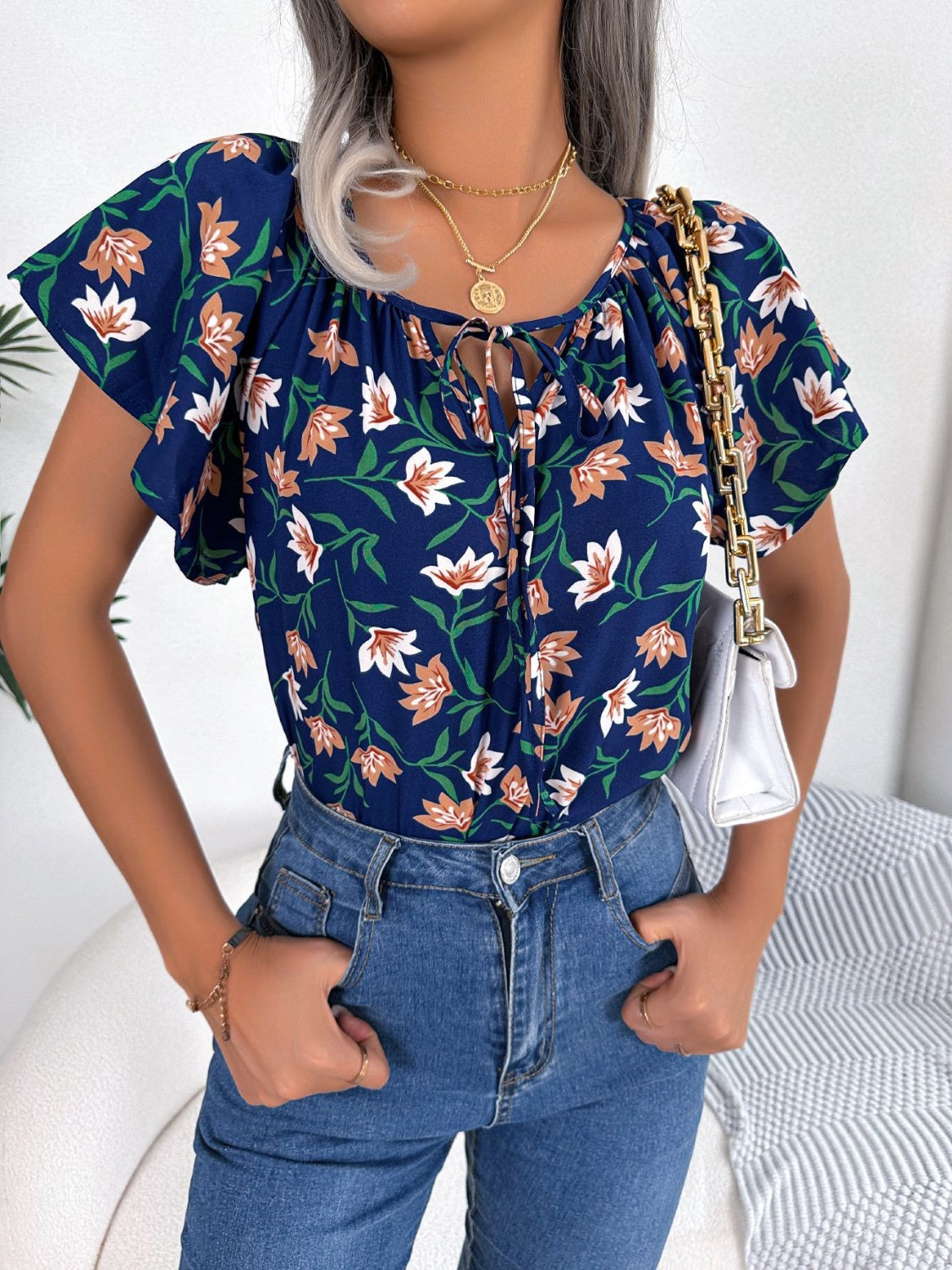 Floral Tie Neck Flutter Sleeve Blouse nicholesgifts