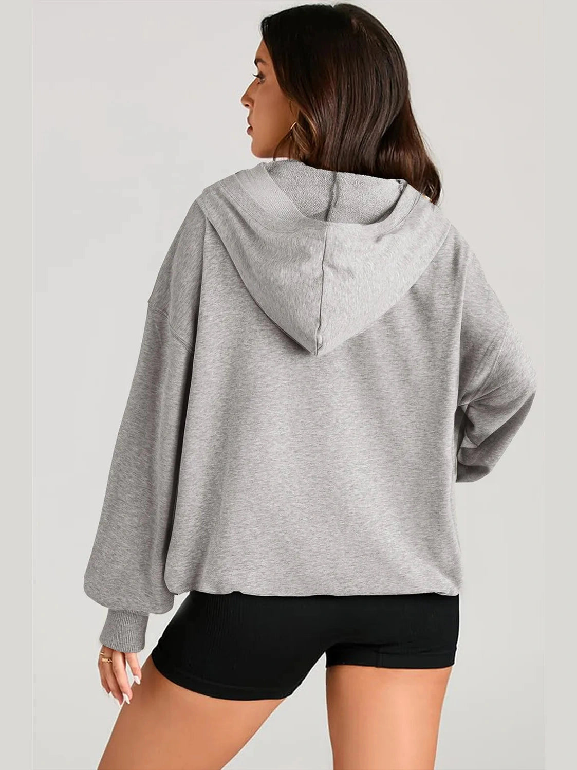 Pocketed Half Zip Long Sleeve Hoodie Trendsi