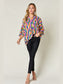 Women Double Take Full Size Geometric Notched Dolman Sleeve Top nicholesgifts