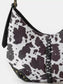 Fame Cow Print Hobo Shoulder Bag with Studded Details nicholesgifts