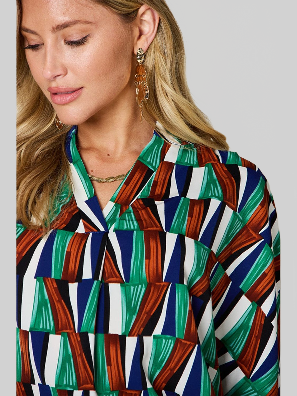Women Double Take Full Size Geometric Notched Dolman Sleeve Top nicholesgifts