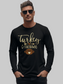 A man wearing a black long-sleeve t-shirt with a 'Turkey & Touchdowns' football graphic, styled with sunglasses, against a plain white background.