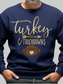 A man wearing a navy blue crewneck sweatshirt with a graphic that reads 'Turkey & Touchdowns' in gold lettering, featuring a football with a heart-shaped white center, shown against a plain white background - NicholesGifts